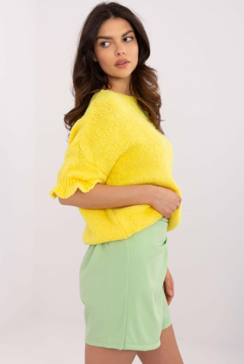 Uroczy sweter z falbanką Desma